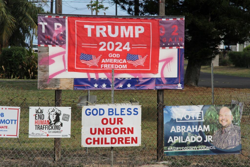 This long-standing Trump shrine on private property has been vandalized several times over the years along Kuhio Highway in Kapaa, Kauai. (Léo Azambuja/Civil Beat/2024)